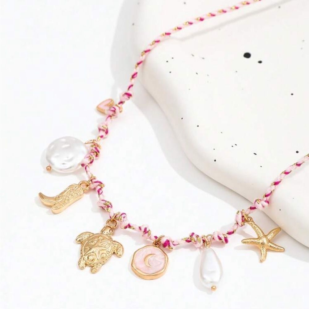 Gold Charm Necklace with Pink Accents A1331